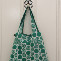 Green and white spotted shoulder bag